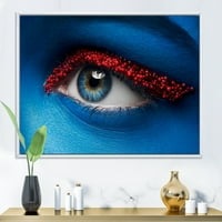 Dizajnerska umjetnost žensko oko s plavom bojom na licu i crvenim kuglicama Moderni uokvireni zidni otisak na
